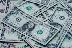 Photo of some US dollars to represent currency exposure